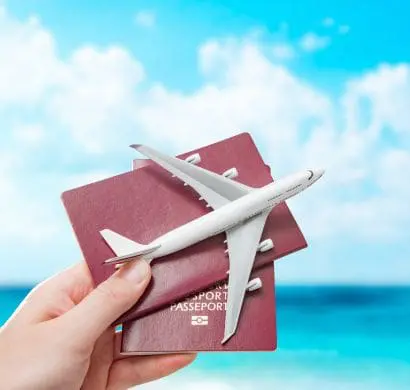 Person about to travel holding their passports